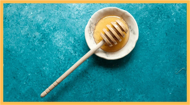 Honey in a plate background.
